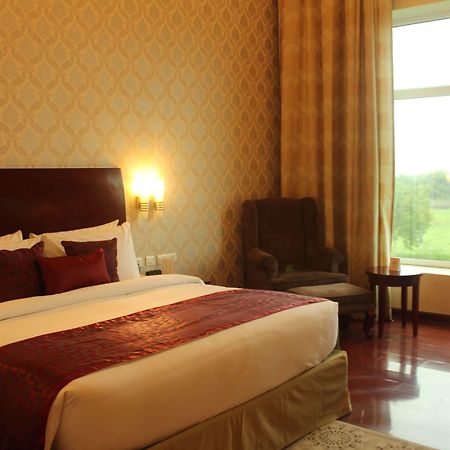 Ramada By Wyndham Jaipur Jaisinghpura Hotel Exterior photo